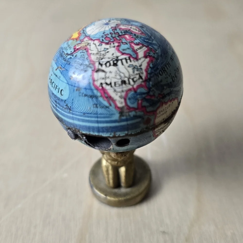 1920s Antique Atlas Holding Earth Pencil Sharpener Made In Germany Trade Routes